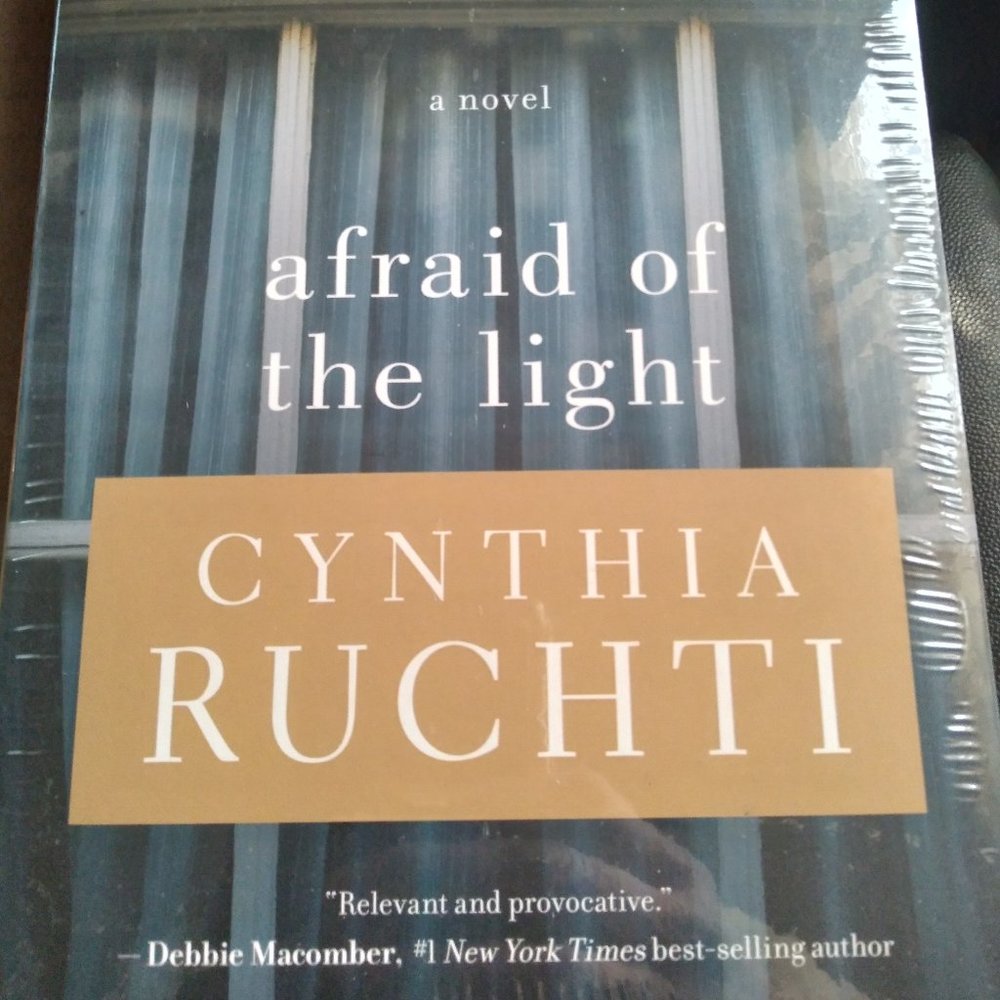 AFRAID OF THE LIGHT BY; CYNTHIA RUCHTI A MOVING TALE OF REDEPTION